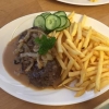 Pannbiff gjord på Highland Cattle serveras med kokt/stekt potatis eller pommes.