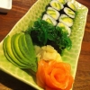 Avocado roll with salmon sashimi