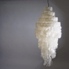 Ceiling lamp made by sea shells. Maker unknow 1970's. Height 140 cm. 
2.200 SEK.